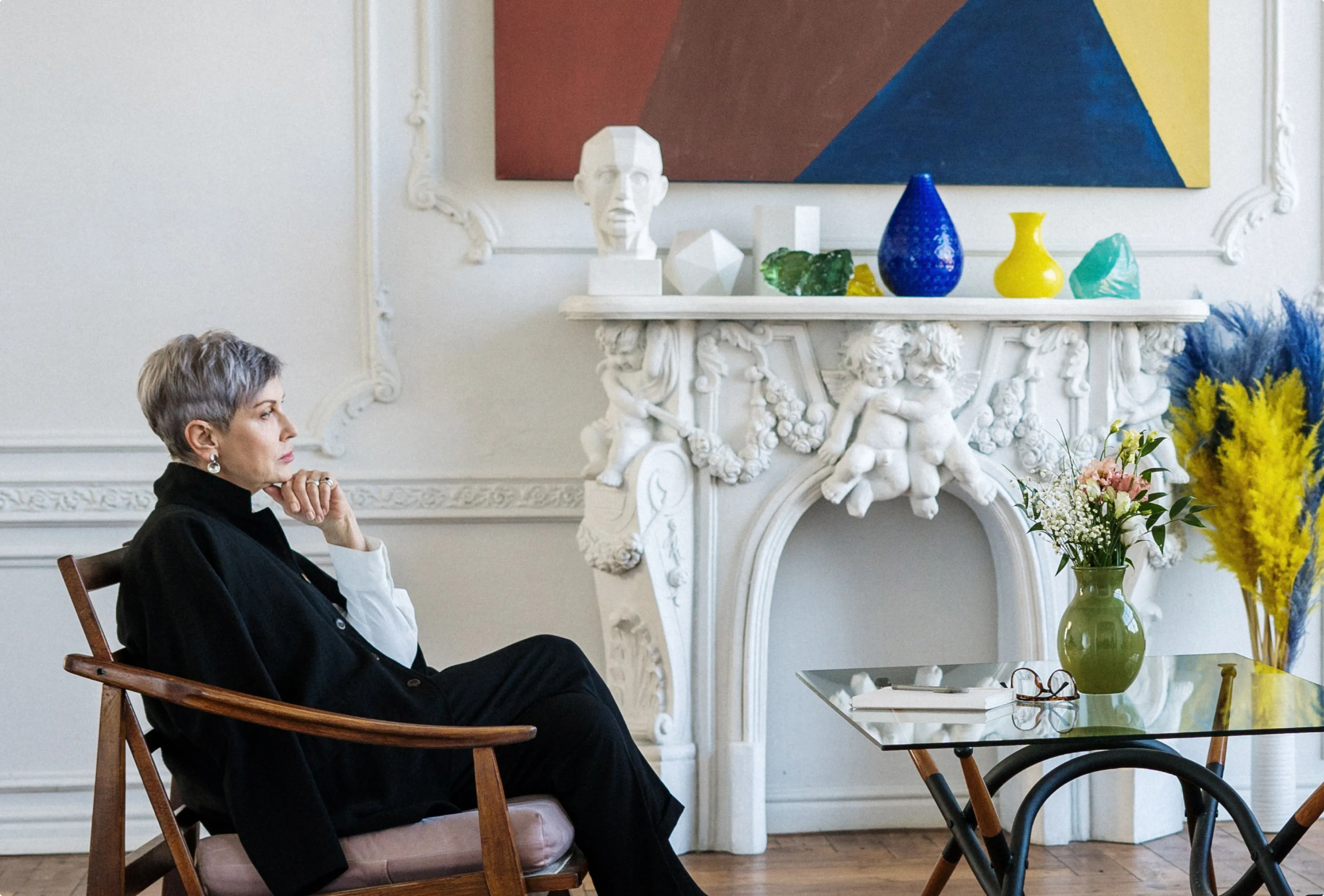 Gallery owner in a refined art space
