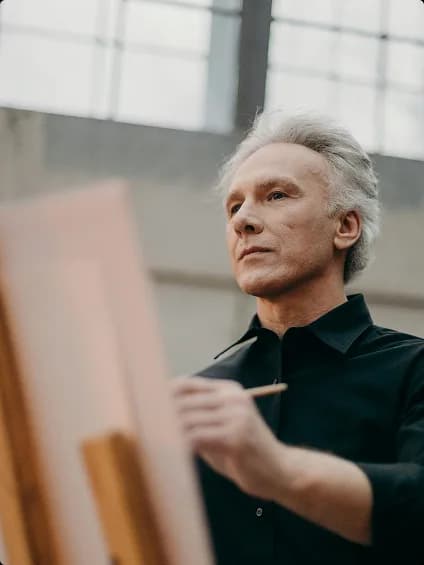 Artist painting in the studio